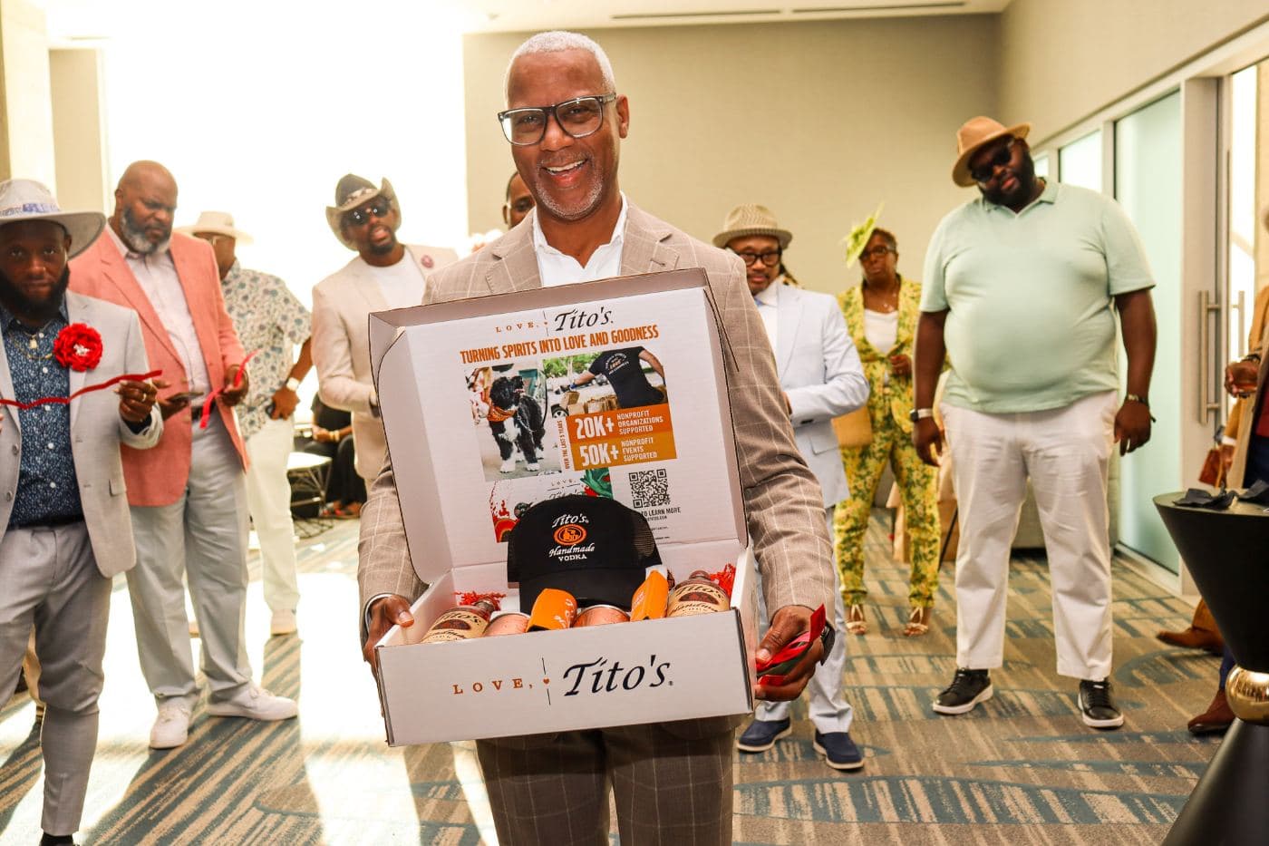 A guest holding a raffle prize